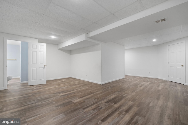 3106 Riverwalk Ct, Annapolis, MD 21403 - finished basement featuring baseboards, visible vents, a drop ceiling, and wood finished floors