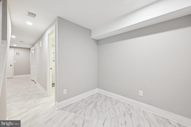 interior space with recessed lighting, visible vents, baseboards, and marble finish floor