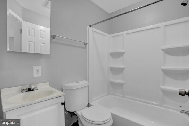 bathroom featuring toilet,  shower combination, and vanity