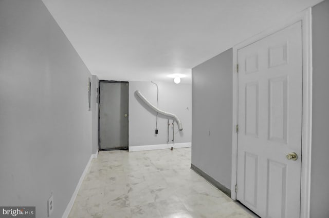 finished basement featuring baseboards