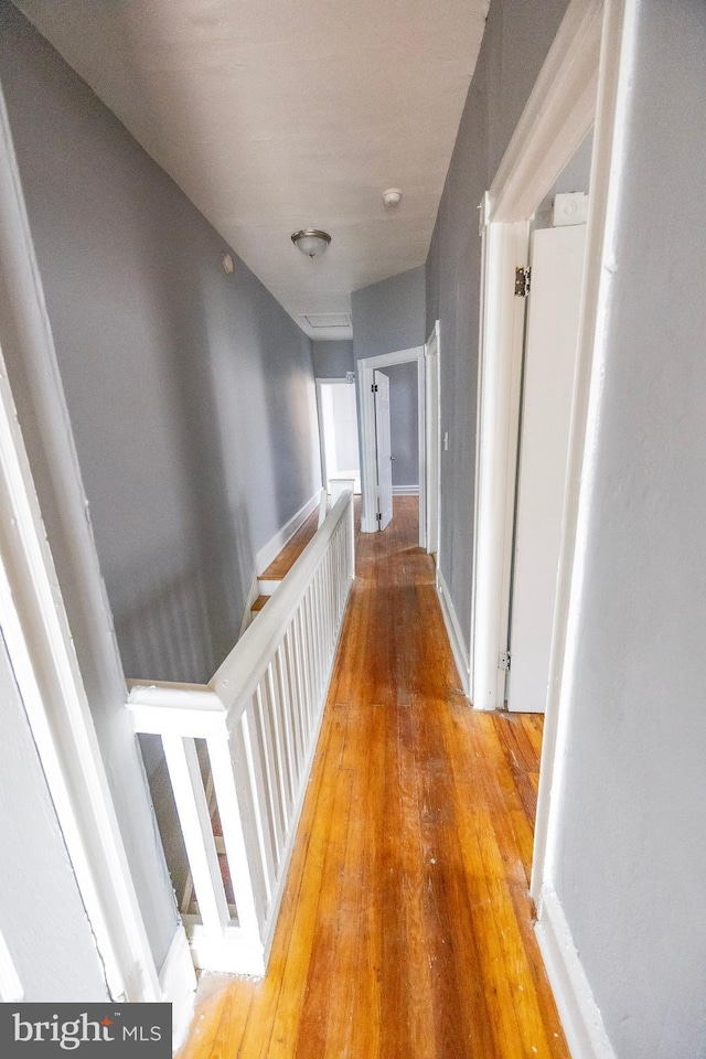 hallway with light wood finished floors