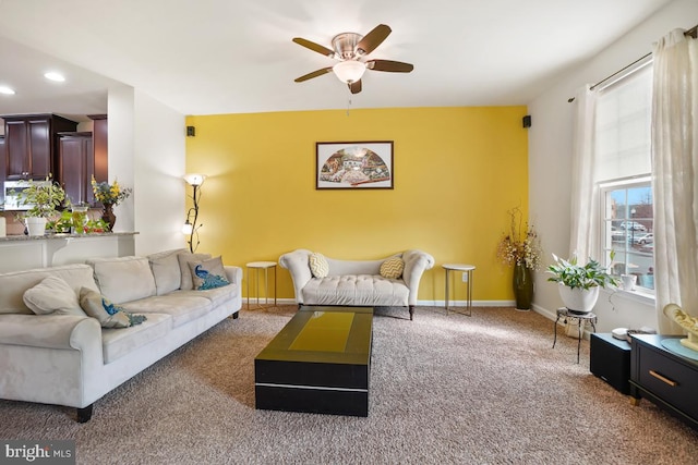 carpeted living area with recessed lighting, baseboards, and ceiling fan