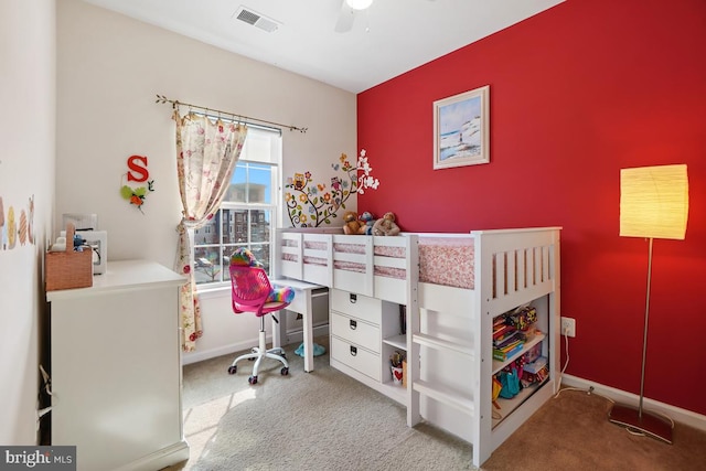 bedroom with baseboards, visible vents, carpet floors, and ceiling fan