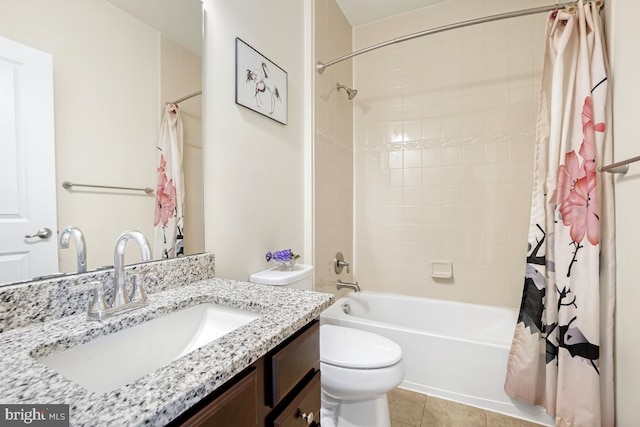 bathroom with tile patterned flooring, vanity, toilet, and shower / bath combo with shower curtain