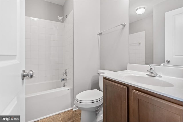 full bath featuring tile patterned floors, shower / bathing tub combination, toilet, and vanity