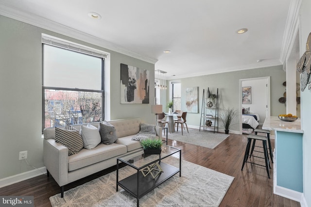 living room featuring recessed lighting, baseboards, dark wood-type flooring, and ornamental molding