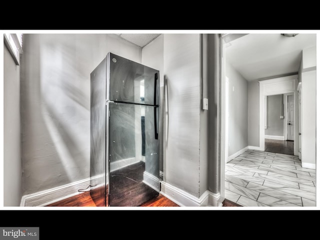 bathroom with baseboards