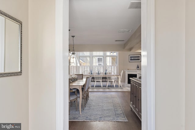 kitchen with dark wood finished floors and visible vents