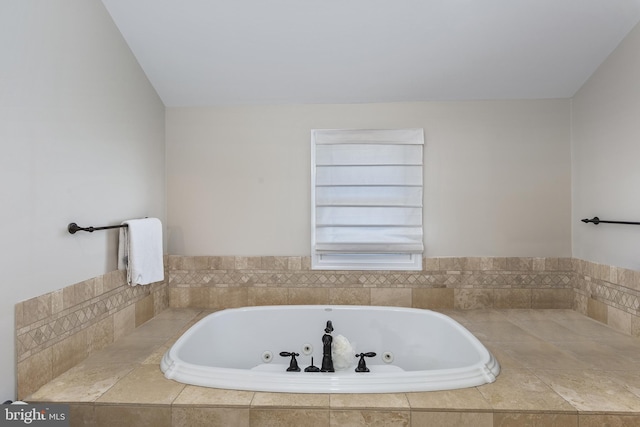 full bath featuring a tub with jets