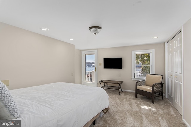 carpeted bedroom with recessed lighting, a closet, and baseboards