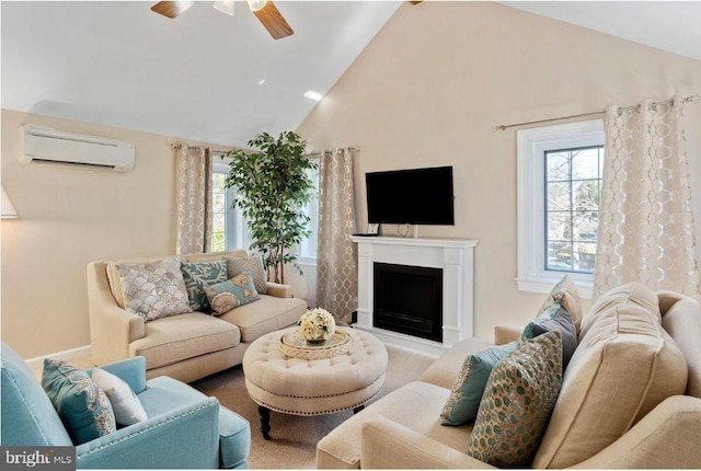 living room with an AC wall unit, high vaulted ceiling, a fireplace, and ceiling fan