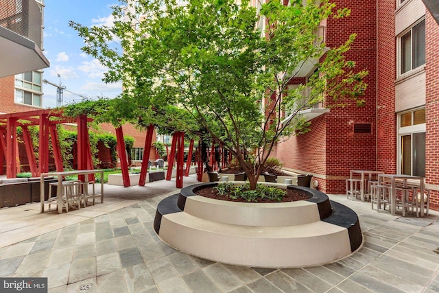 surrounding community featuring a patio area