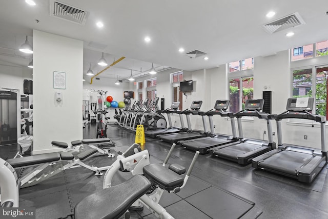 exercise room featuring recessed lighting and visible vents