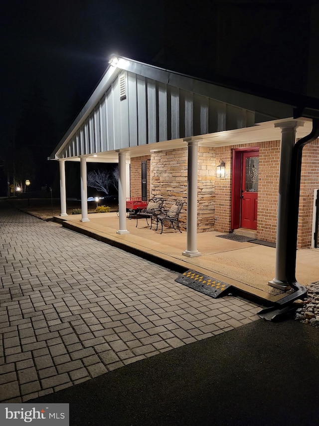 view of patio at twilight