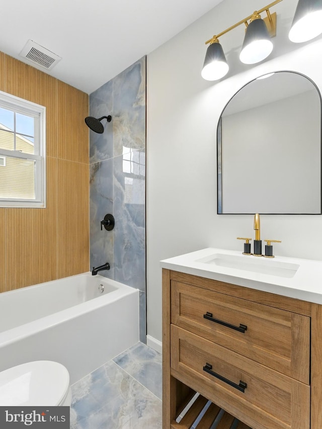 bathroom featuring shower / bathing tub combination, visible vents, toilet, and vanity