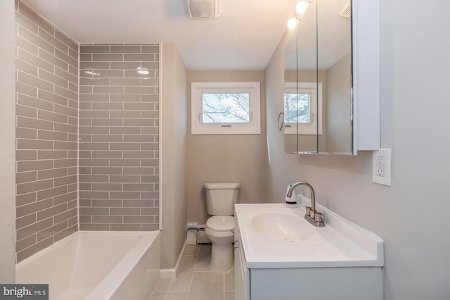 full bathroom featuring vanity, baseboards, shower / bath combination, tile patterned floors, and toilet