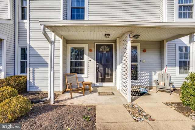 entrance to property with a porch