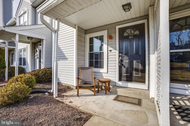 doorway to property with covered porch