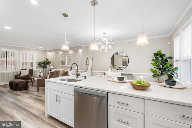 kitchen featuring light wood-type flooring, a sink, white cabinets, crown molding, and dishwasher