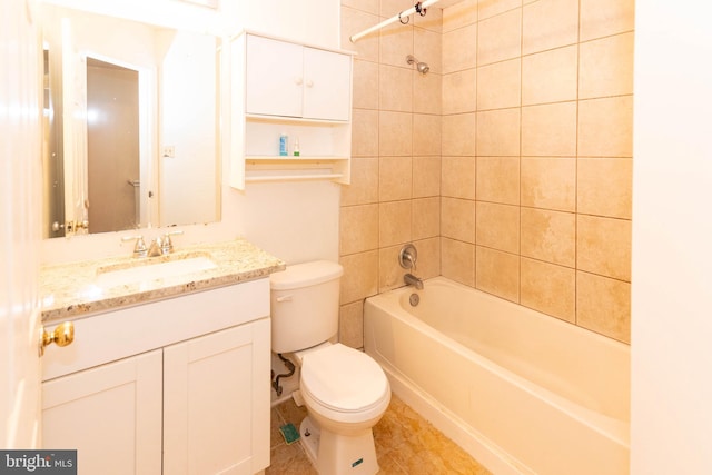 full bathroom featuring vanity, toilet, and bathing tub / shower combination