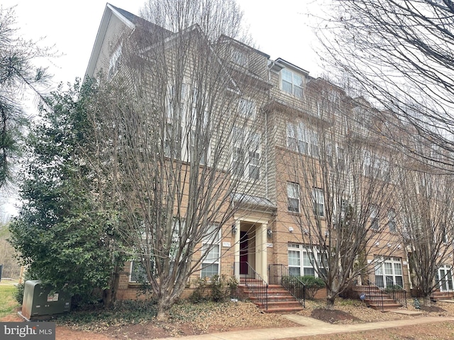 multi unit property featuring brick siding