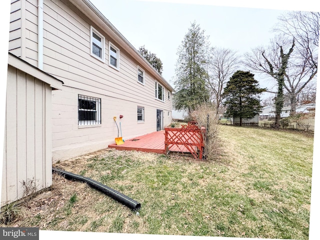 view of yard with a deck