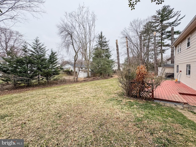 view of yard featuring a deck