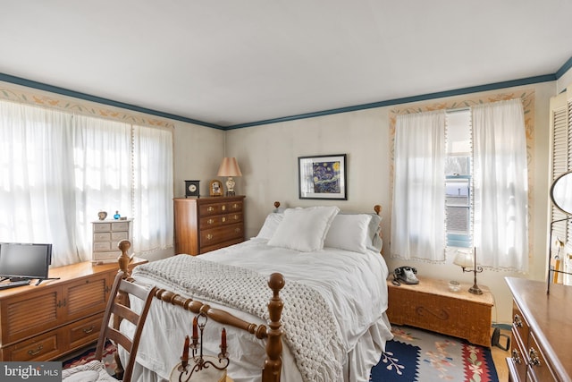 bedroom featuring ornamental molding