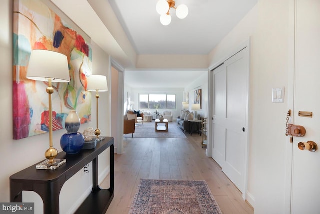 hall featuring light wood-style flooring