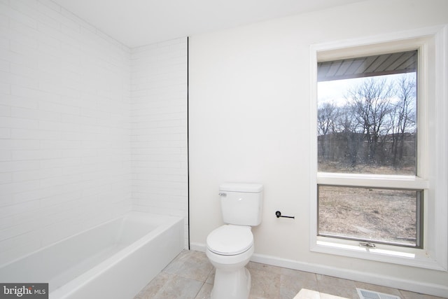 bathroom with visible vents, baseboards, and toilet