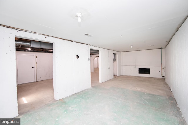 unfinished basement featuring visible vents