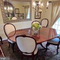 dining room featuring a chandelier