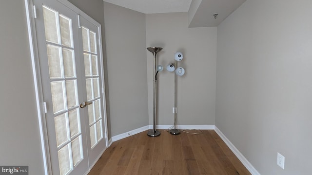 room details featuring wood finished floors and baseboards