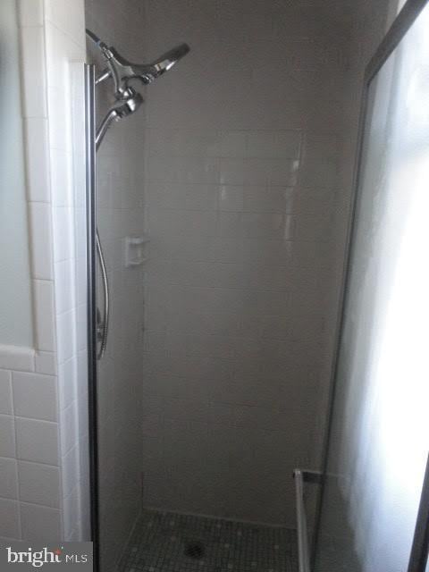 full bath with a stall shower