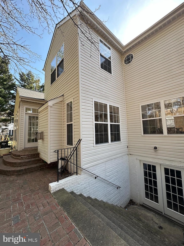 back of house with cooling unit and a patio area