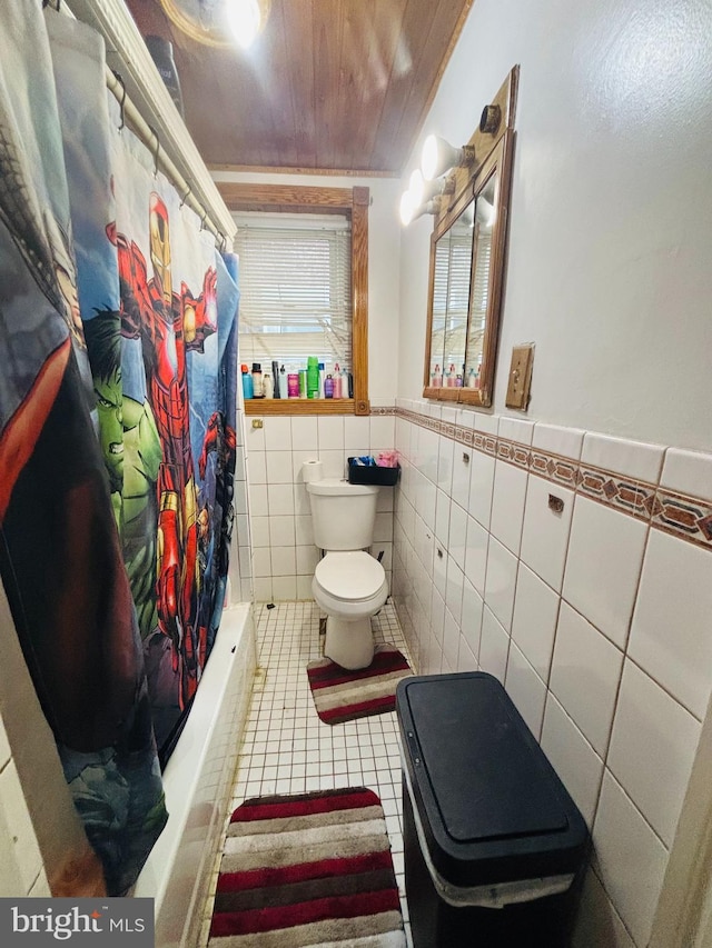 3316 Jasper St, Philadelphia, PA 19134 - full bath featuring tile patterned flooring, wood ceiling, wainscoting, tile walls, and toilet