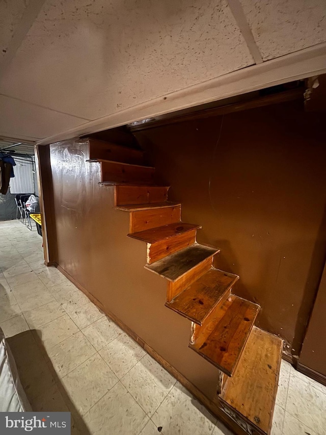 3316 Jasper St, Philadelphia, PA 19134 - staircase featuring tile patterned floors