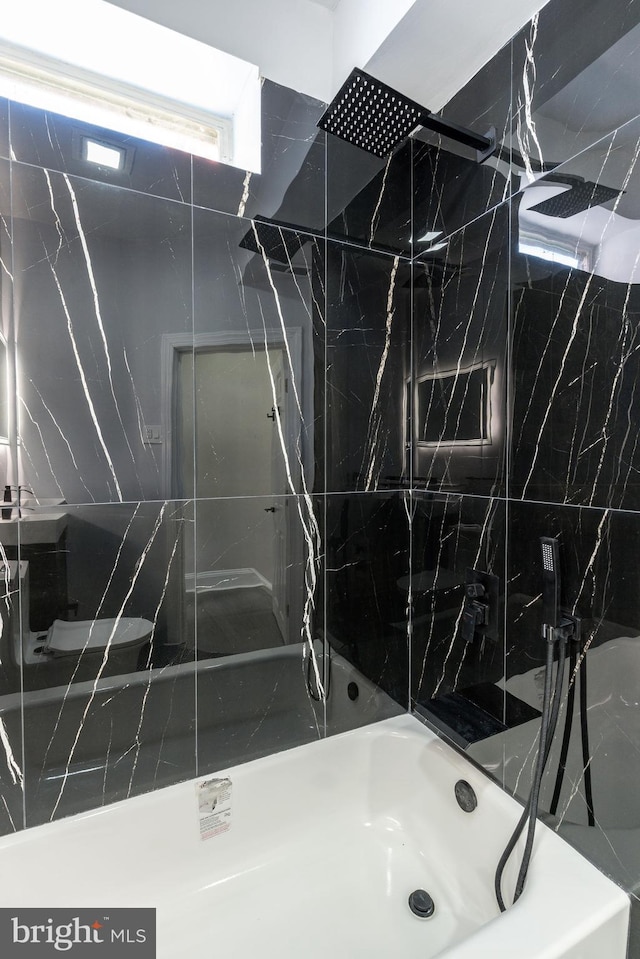 interior space with a walk in shower