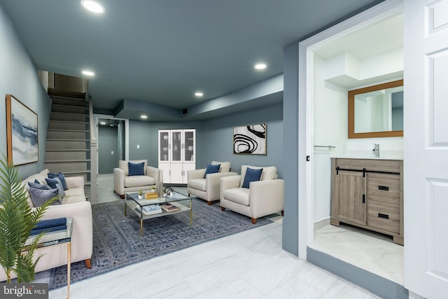 living room with stairs, recessed lighting, and marble finish floor