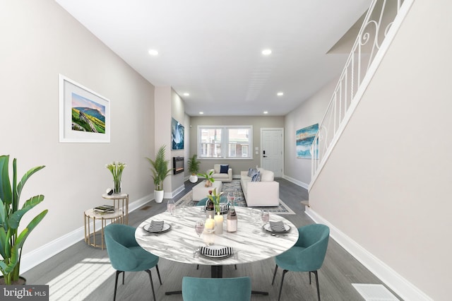 dining room featuring visible vents, recessed lighting, baseboards, and wood finished floors