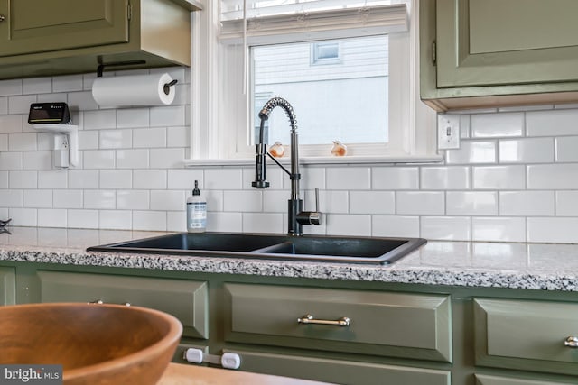 1175 Letort Rd, Conestoga, PA 17516 - kitchen featuring green cabinets, a sink, and decorative backsplash