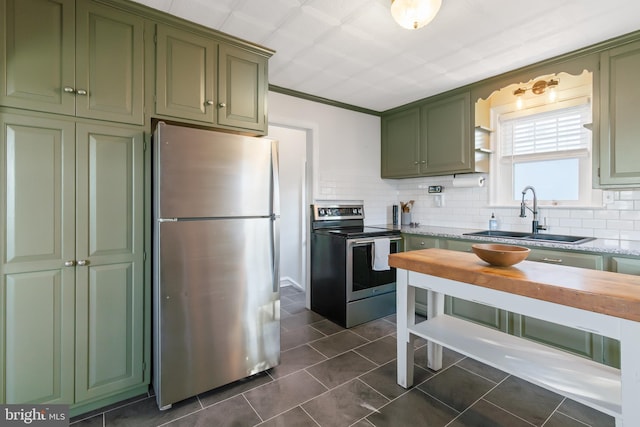 1175 Letort Rd, Conestoga, PA 17516 - kitchen with stainless steel appliances, green cabinets, a sink, and wooden counters