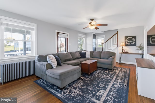 1175 Letort Rd, Conestoga, PA 17516 - living area featuring radiator, ceiling fan, stairs, and dark wood finished floors