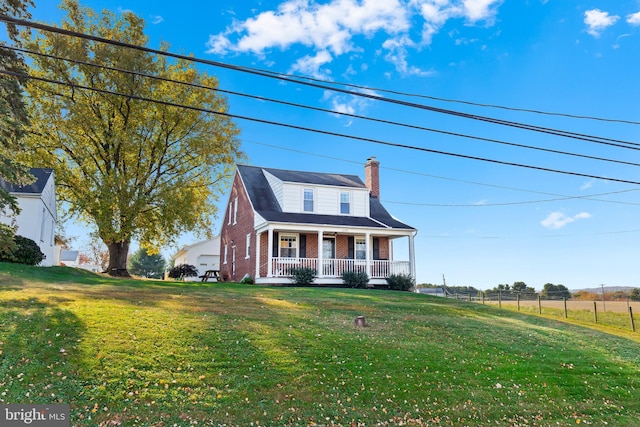 1175 Letort Rd, Conestoga, PA 17516 - view of front of property featuring covered porch, brick siding, a chimney, and a front lawn
