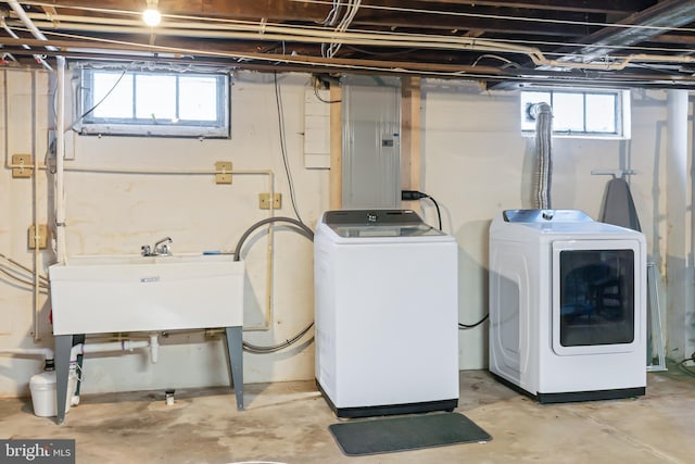 1175 Letort Rd, Conestoga, PA 17516 - laundry area with electric panel and washing machine and clothes dryer