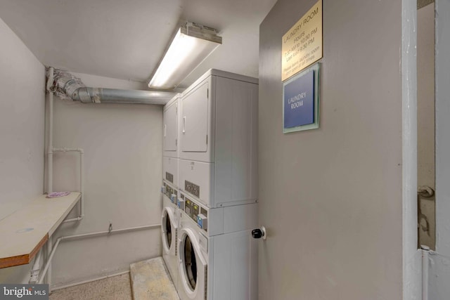 shared laundry area featuring stacked washer and dryer