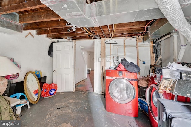 unfinished basement featuring washer / dryer