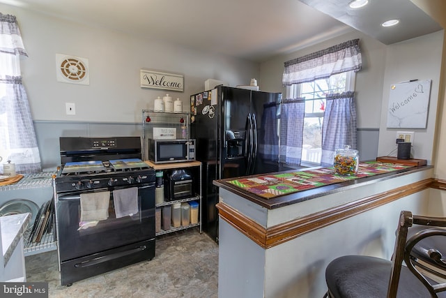 kitchen with black appliances