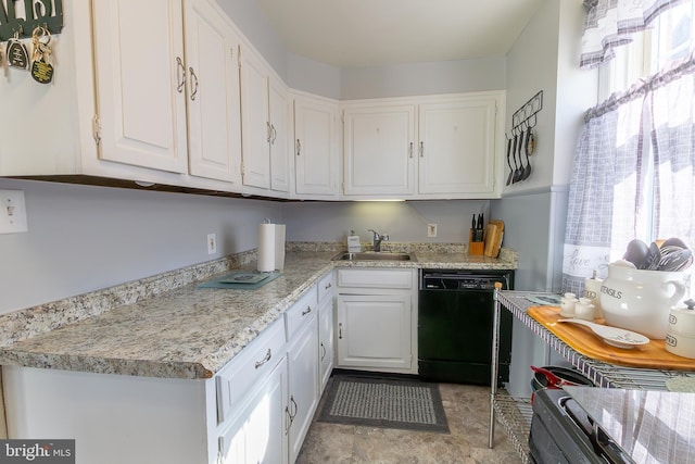 kitchen featuring a sink, white cabinetry, light countertops, dishwasher, and a healthy amount of sunlight