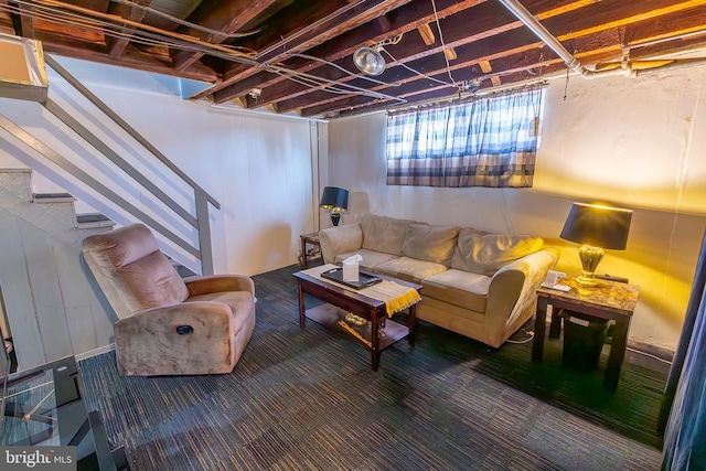 carpeted living room with stairs